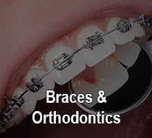 Braces being examined by an orthodontist