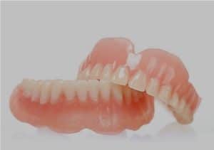 Full dentures stacked on each other
