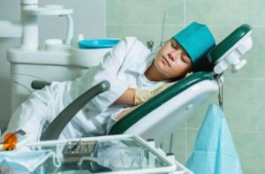 Patient sleeping through dental treatment at Carson & Carson, DDS in Oxnard, California